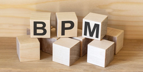 BPM text Business Process Management on wooden cubes