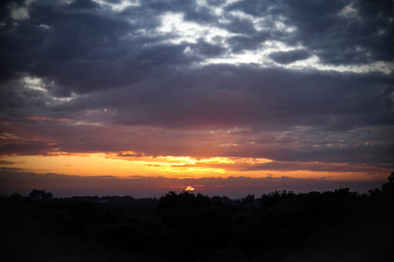 Fototapeta na wymiar Sunset in the clouds