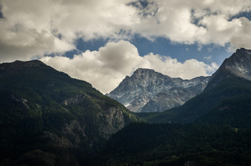 Italian Alps mountains in a cloudy september day, seen from Courmayeur area, Aosta Valley, Italy.