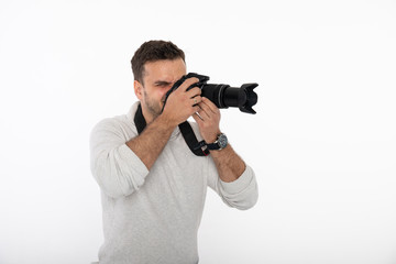 Photographer looking through the lens