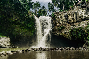 Fototapeta na wymiar Tegenungan Waterfall - one of the places of interest of Bali