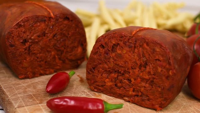 Calabrian nduja salumi. Nduja is a particularly spicy, spreadable pork salumi from Calabria, Italy. Selective focus.