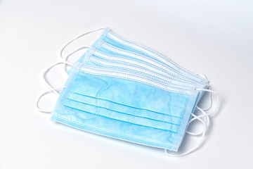 Protective face mask on a white background to protect and prevent the spread of the virus, flu, and pollution. Cover mouth and nose with a mask.