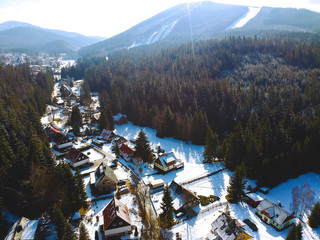 Ski resort in Harrachov Czech Republic. Snow-capped mountains in the Czech Republic Harrachov. Flying in the snow on the mountains.