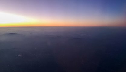 Sunset over the mountains of planet Earth.