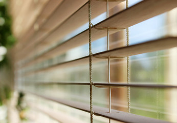 Close-up open wooden blind in eco style