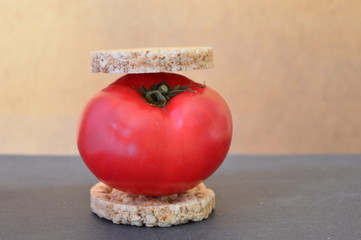red tomato on a wheat bread 