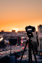 Camera on tripod at sunset