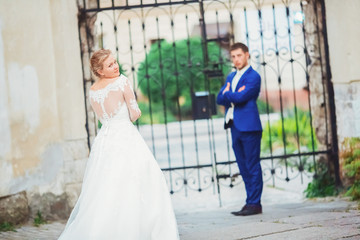 Fototapeta premium happy romantic young couple celebrating their marriage
