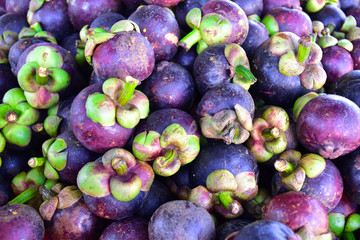 Pile of mangosteen with blurred background.