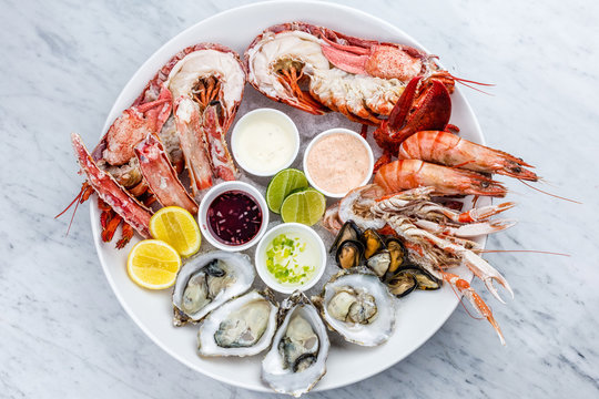 Mixed seafood platter of oysters, lobster and king prawns 