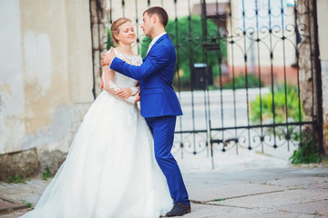 Fototapeta premium happy romantic young couple celebrating their marriage