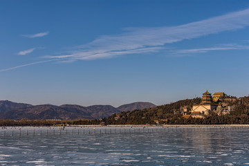 Fototapeta premium Summer palace in Beijing, China, during winter with frozen Kunming lake