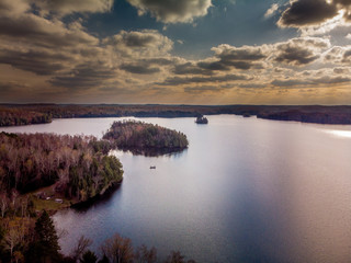 Fototapeta premium Northwoods Lake Sunset with fishing boat