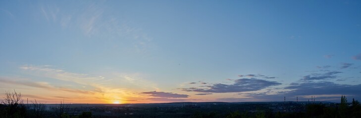 Panorama of the evening sunset. Sky sunset background panorama concept