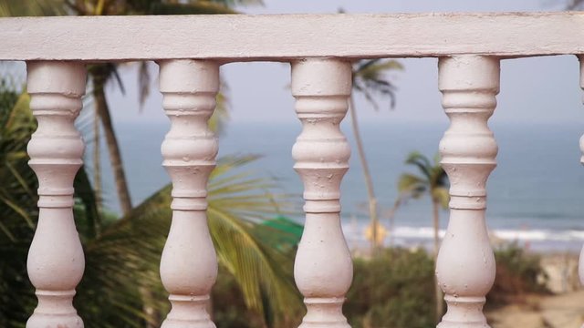 Balcony with balusters. Classic decorative columns baluster in the house