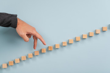 Male hand walking his fingers up the steps