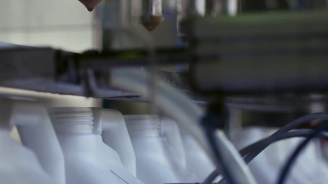 Filling plastic bottle on the conveyor. Clip. High technology Plastic bottle manufacturing industrial, Raw material plastic bottle production, precision plastic bottle blow method