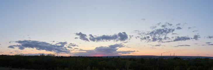 Panorama of the evening sunset. Sky sunset background panorama concept