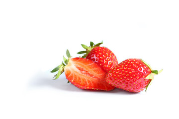 Strawberry. Beautiful sweet berry of red color on a white background. Place for text. High-quality photos for web sites of banners and magazines.