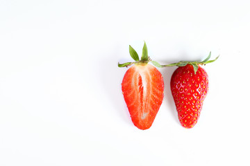 Strawberry. Beautiful sweet berry of red color on a white background. Place for text. High-quality photos for web sites of banners and magazines.