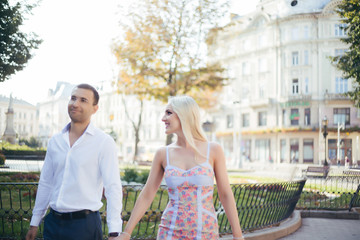 Fototapeta premium Smiling couple in love outdoors, lviv. summer