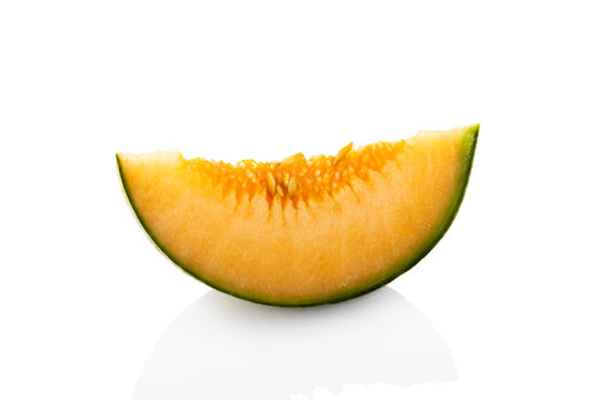 Melon. A slice of melon on a white background. (Tr - kavun)
