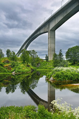 Fototapeta premium The Saltstraumen Bridge is a cantilever box girder bridge that crosses the Saltstraumen strait between the islands of Knaplundsoya and Straumoya in Bodo Municipality in Nordland county, Norway.