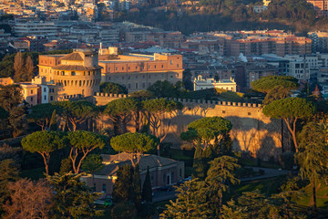 Fototapeta na wymiar View of Vatican city and Rome from the dome of Saint Peter cathedral in the morning