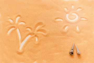 Fototapeta na wymiar Background the summer holidays, the sun, drawn in the sand, palm trees and seashells. Concept of summer vacation on the beach