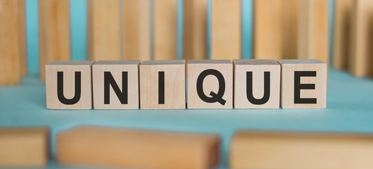 unique word written on wood blocks. concept