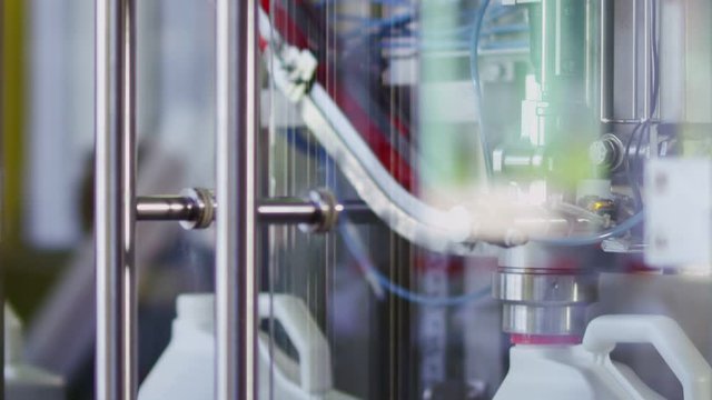 Plastic bottle on the conveyor. Clip. High technology Plastic bottle manufacturing industrial, Raw material plastic bottle production, precision plastic bottle blow method