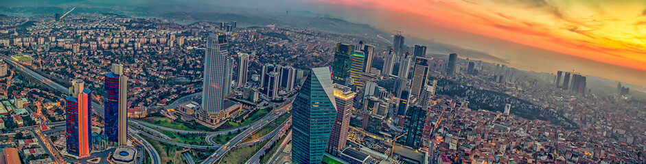 Istanbul sunset skyline aerial panoramic view from Sapphire tower, Levent Financial District, Istanbul Turkey. Beautiful Bosphorus Bridge, business towers, modern offices, central banks, skyscrapers
