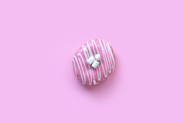 Classic pink donut with white marshmallows. Sweet food for party. 