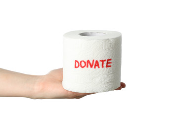 Female hand holds toilet paper with inscription Donate, isolated on white background