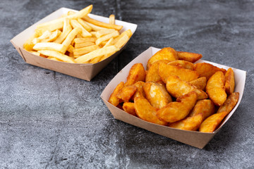 .french fries in disposable dishes
