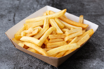 .french fries in disposable dishes