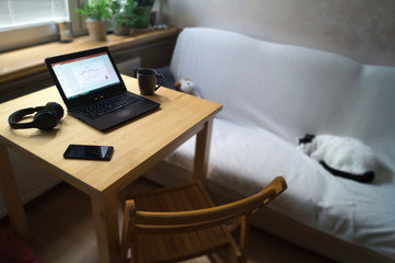 Computer on wooden table in home office