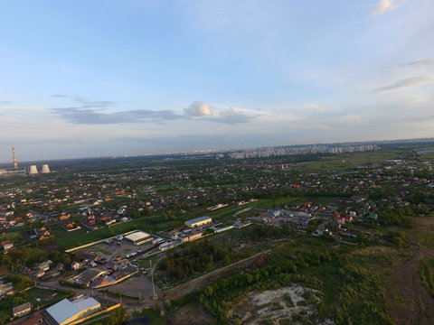 Aerial view of the saburb landscape (drone image). Near Kiev. Sunset time.