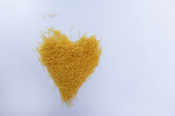 heart of macaroni on a white background