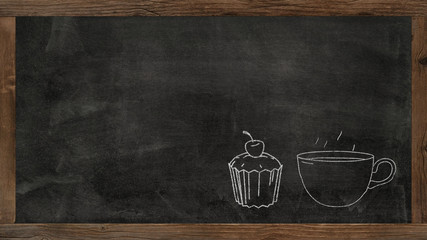 blackboard with a cup of coffee and cupcake