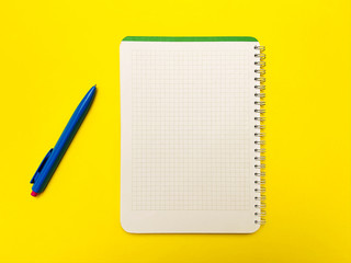 Notepad for writing on a yellow background