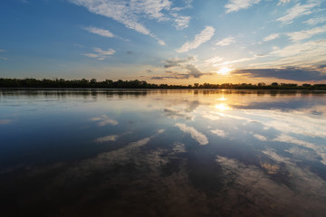 Fototapeta premium Beautiful evening on the river at sunset
