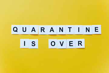 End of quarantine. The inscription quarantine is over on a yellow background