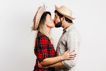 Brazilian couple wearing traditional clothes for Festa Junina - June festival