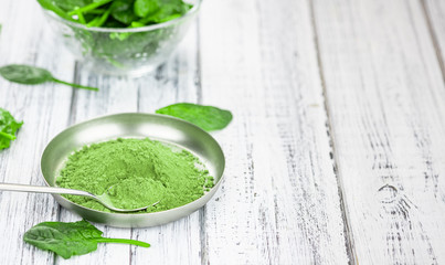 Homemade spinach powder (close up; selective focus)