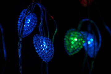 Abstract background of multi-coloured led lights of a garland