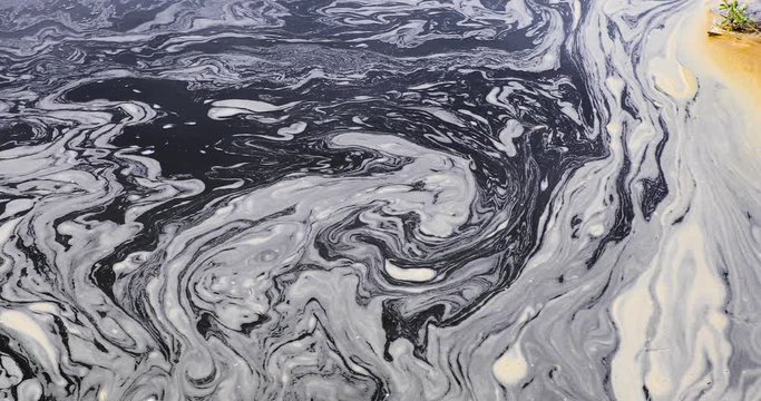 Pollution waters of a river, close-up