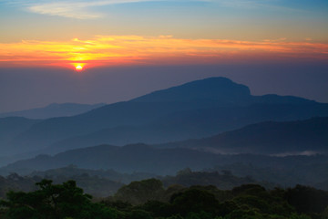 Fototapeta na wymiar Foggy mountain landscape at early morning sunrise in Tiger Head Hill, Chiang Mai, Thailand, Thai people call , Doi Hua Seur
