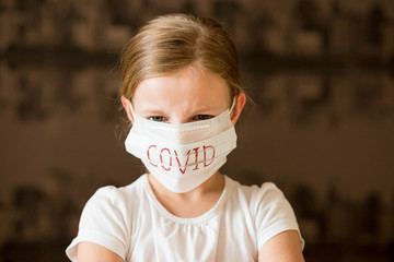 Little girl wearing medical. coronavirus. SARS, spread around the world. Impact of pandemic virus.quarantine, social isolation. stop virus, stay home. protect coronavirus outbreak.social distancing.